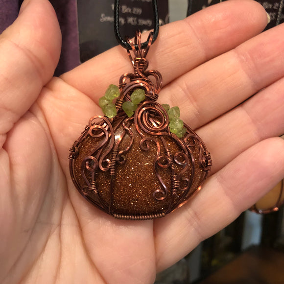 Pumpkin Necklace - Wire Wrapped Goldstone with Peridot Leaves